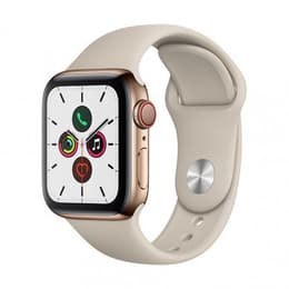 Apple Watch (Series 4) 2018 GPS + Cellular 44 mm - Aluminium Gold - Sportarmband Grau